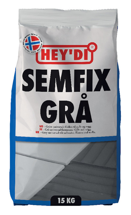 Förpackning med texten "HEY'DI SEMFIX GRÅ 15 KG", med norska flaggan och en grå grafisk detalj.