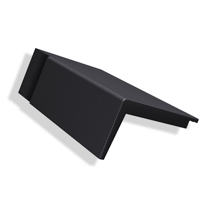 Svart betongpanna med vinklad form, designad för takavslut.
