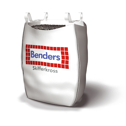 Storsäck med grå skiffersten, etikett med texten "Benders Skifferkross".