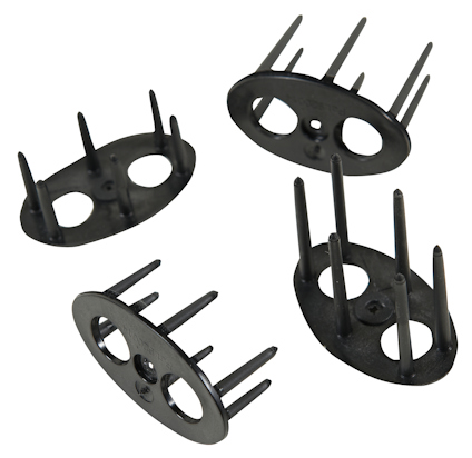 Svarta plastkomponenter med fyra vertikala pinnar och ovala baser, set av fyra.