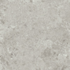 Grå granitkeramik med ljusa och mörka mineralmönster. Subtil textur med inslag av små vita och grå fläckar.