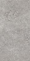 Granitkeramik med naturtroget cementutseende och subtil textur i grå nyanser.