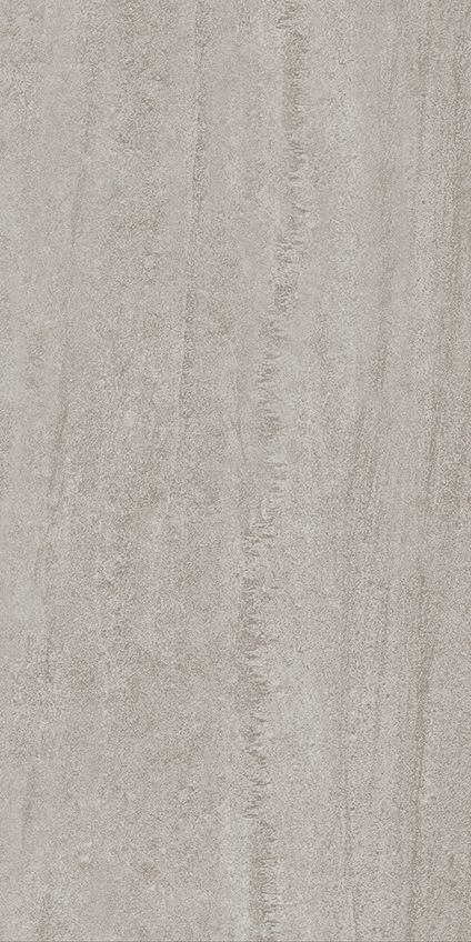 Ljusgrå granitkeramikplatta med en subtil cementliknande textur och matt yta.