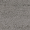 Granitkeramikplatta med en mörkgrå, cementliknande yta och textur.