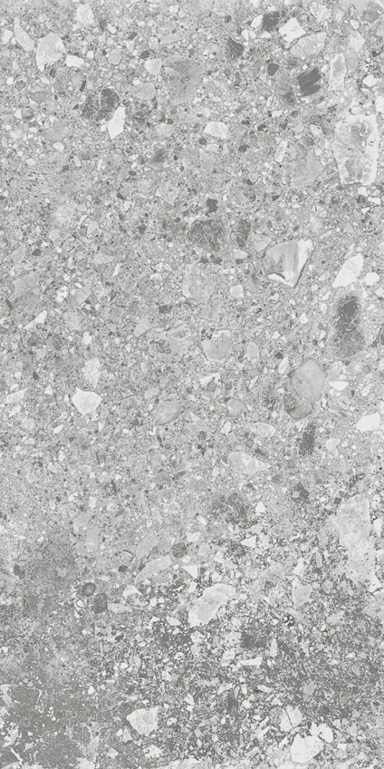 Grå granitkeramik med varierande ljus- och mörkare grå stenar och mineralfragment.