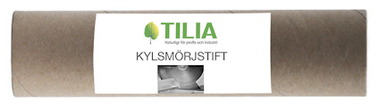 Cylinderformad behållare med etikett där det står "TILIA KYLSMÖRJSTIFT".