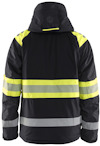 Svart jacka med gula och silverfärgade reflexband på ärmar och rygg.