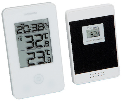 Trådlös termometer med klocka, visar temperatur inomhus och utomhus, med en separat sensor.