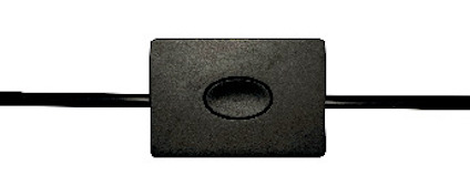 Svart rektangulär dimmer med en oval knapp i mitten och två kablar som löper rakt ut från vardera sidan.