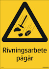 Gul skylt med svarta piktogram av hammare och tegelstenar samt texten "Rivningsarbete pågår".