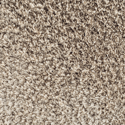 Beige och brunmelerad textilgolvyta med tät lugg.