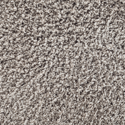 Beige och brunt tuftat textilgolv med mjuka fibrer och ojämn textur.