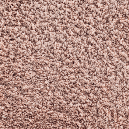 Rosa textilgolv med mjuk och fluffig yta, närbild av materialets struktur.