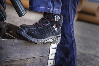 Skyddskänga med rött snöre, blött vattenfläckat skinn och "Jalas" logotyp.