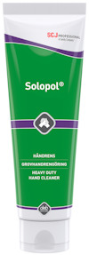 Förpackning för grov handrengöring, märkt "Solopol". Grön etikett med vita och lila detaljer.