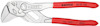 Tångnyckel med rött handtag och justerbar käke, märkt "KNIPEX" och "86 03 150" på handtagen.