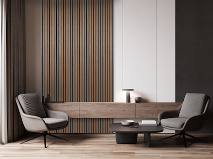 Moderna fåtöljer och soffbord framför en randig väggpanel i ett elegant vardagsrum.