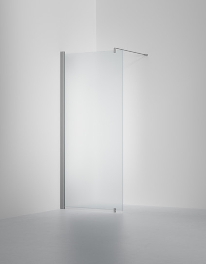 Frostat glasduschvägg med borstad metallram, monterad mot en vägg i ett minimalistiskt badrum.