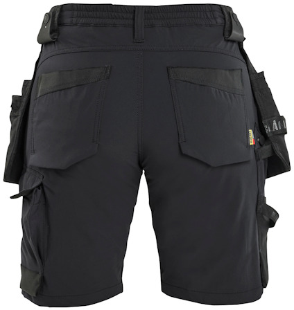 Svarta arbetsshorts med flera fickor och hällor upptill och på sidorna.