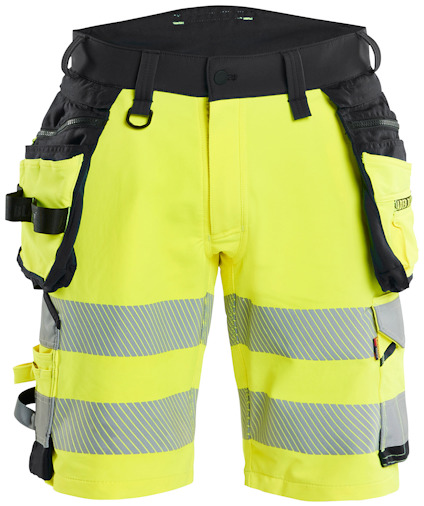 Gul och svart arbetsshorts med reflekterande detaljer och flera fickor samt hällor.
