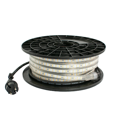 Rulle med transparent LED-slinga lindad runt en svart spole, elektrisk kontakt synlig.