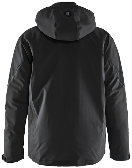 Svart jacka med huva, sedd bakifrån.