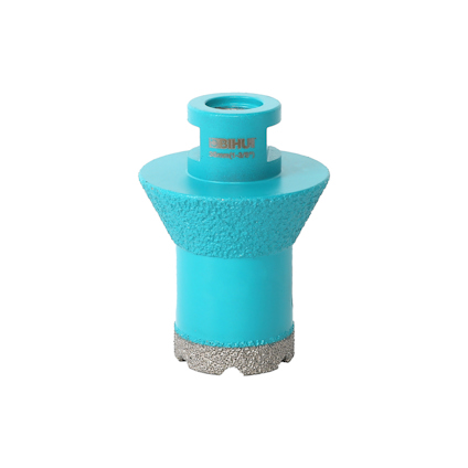 Turkos diamantborr med cylindrisk form och grovt texturerad yta.