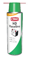 Sprayburk med etikett "HD Vaseline" och illustration av ett batteri. Grön och vit design, rött spraymunstycke.