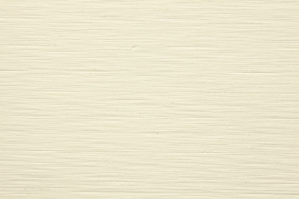 En ljusbeige fasadskiva med subtil textur och horisontella linjer.