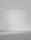 Transparent glass panel with metallic brackets on a plain gray background.