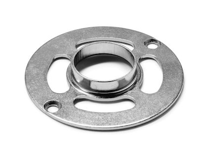 Metallring med en central cirkulär öppning och tre avlånga hål runtom.