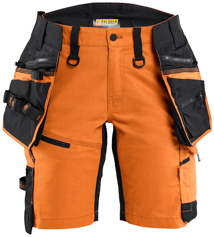 Arbetsshorts i orange och svart med flera fickor och hällor.