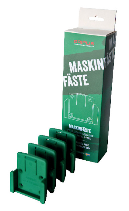 Förpackning och fyra gröna maskinfästen. Text på förpackningen: "MASKINFÄSTE".