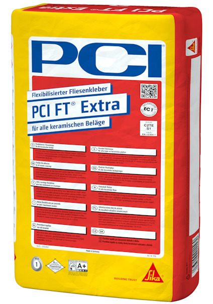 Förpackning av PCI FT Extra kakellim med text och symboler på tyska.