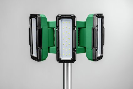 Grön och svart LED-lampa med tre rektangulära paneler på ett metallstativ.