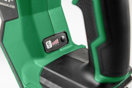 Grön och svart handtag med batterinivåindikator och fyra röda lysdioder på en elektrisk verktyg.