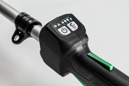 Handtag med svart kontrollpanel, visar strömbrytare och indikatorer för batterinivå.