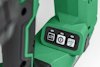 Grön elektrisk verktyg med kontrollpanel med tre knappar, inklusive en med en nolla och en med en man som springer.