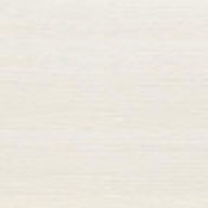Ljusbeige, texturerad yta med horisontella linjer.