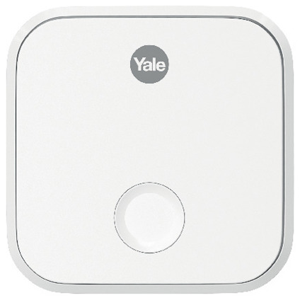 Vit, fyrkantig enhet från Yale med rund knapp och logotyp i mitten.
