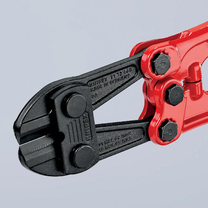 Bultsax med röda handtag och svart klippdel, text "KNIPEX Made in Germany".