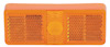 Rektangulär orange reflex med två mönstrade ytor och en central cirkulär del.