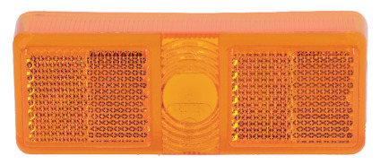 Rektangulär orange reflex med två mönstrade ytor och en central cirkulär del.
