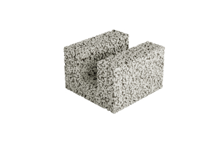 Grå betongblock med grov yta, formade som ett U.