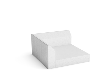 L-format betongblock med borstad yta och hörnutformning.